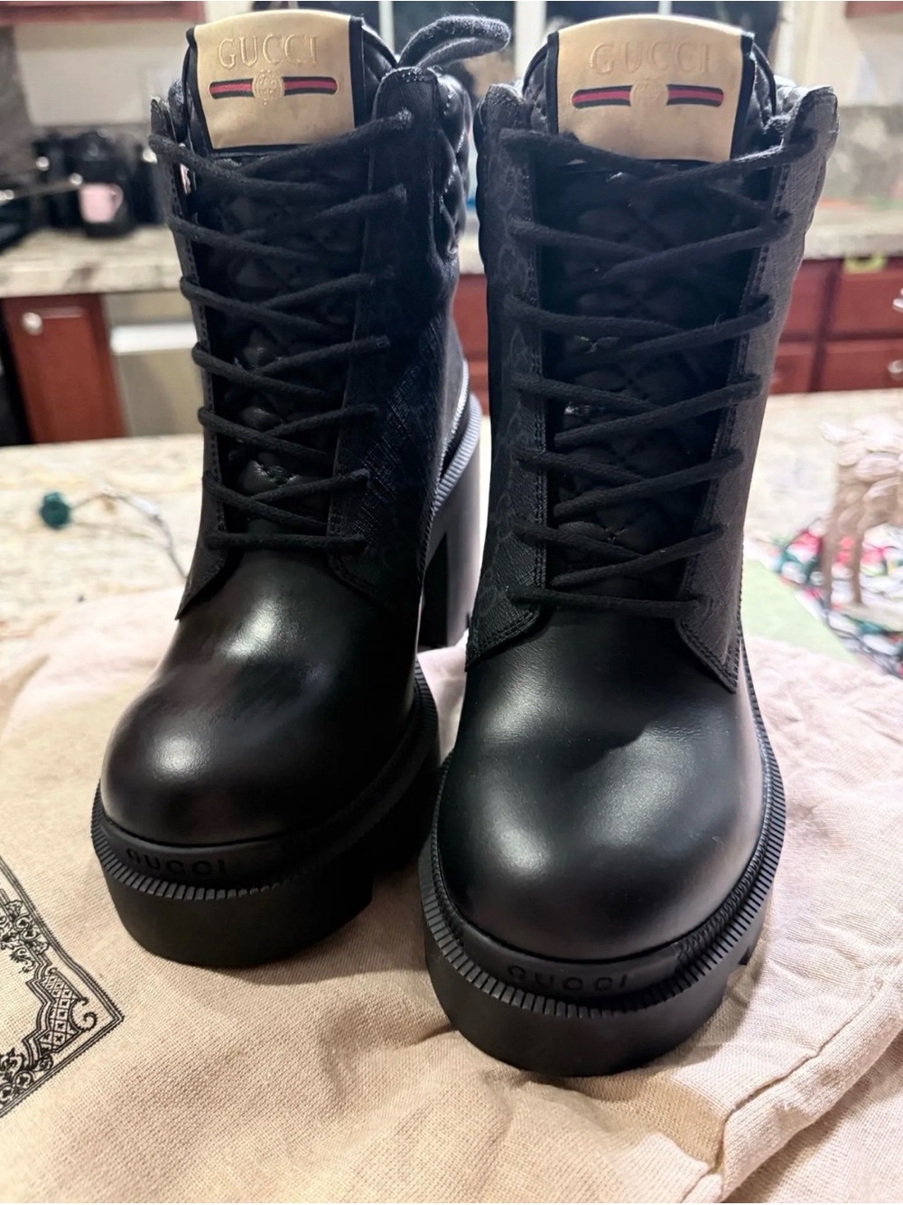 Gucci Black Leather Lace-Up Platform Boots with Gold Tongue Detail